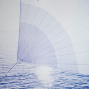 Spinnaker up at sundown